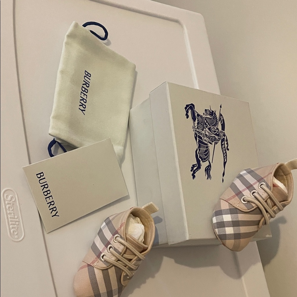 Brand new baby, Burberry booties. Unisex. Still in box unopened never worn.